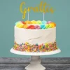 Cake topper - Grattis (Guld)