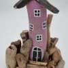 Ett hus i drivved (Rosa)