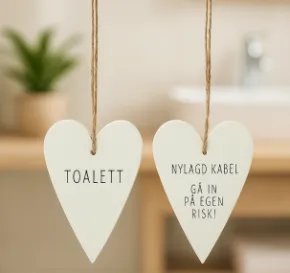 Toalettskylt - Nylagd kabel